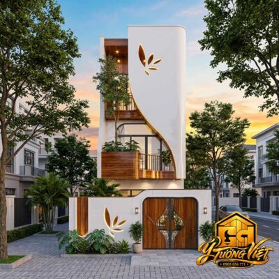 Mẫu nhà phố 3 tầng 6x18m với mặt tiền đường cong trắng, họa tiết 5 lá, ban công gỗ nâu và cổng nghệ thuật